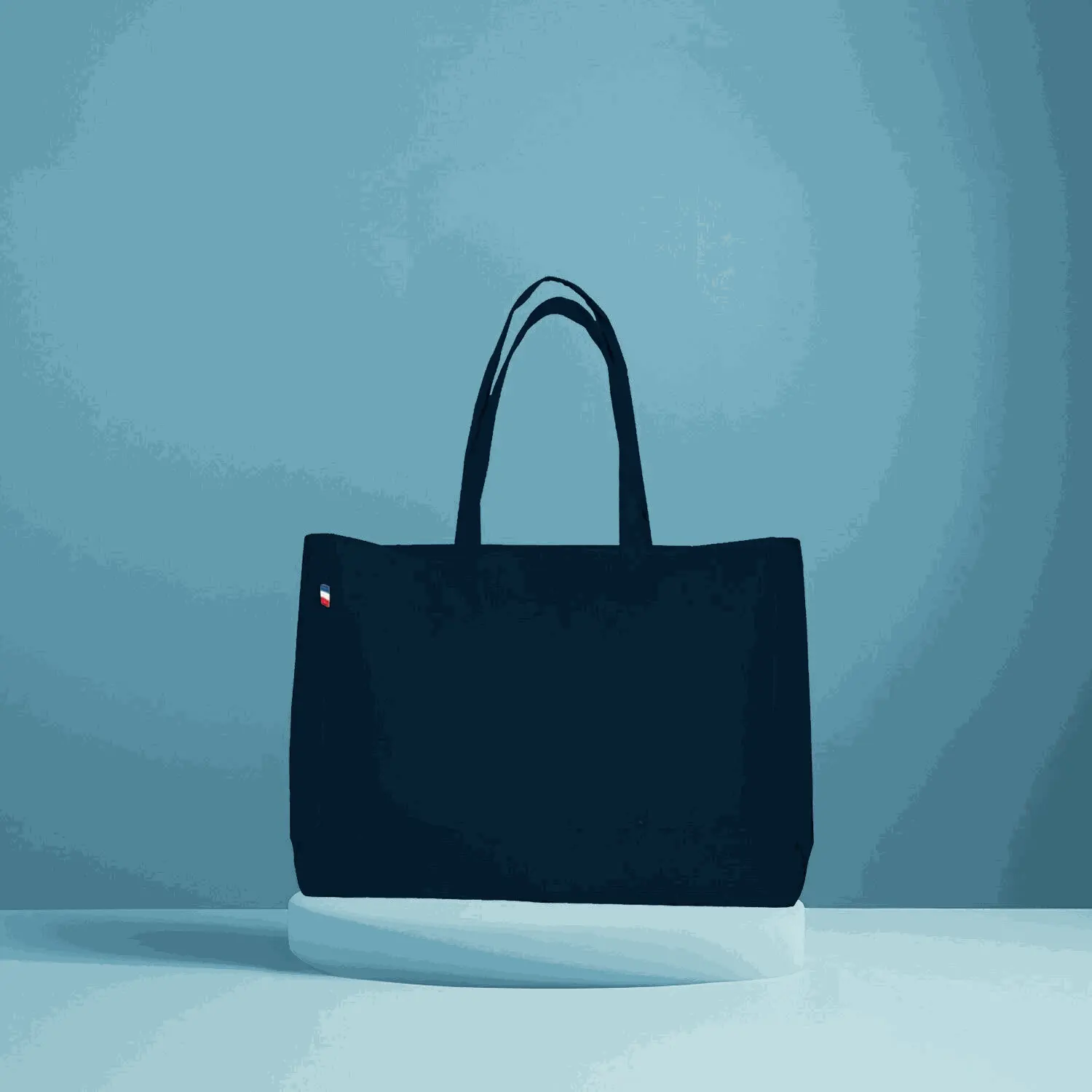 Sac cabas en coton noir grand format avec soufflet total, fabrication française, élégant et robuste, parfait pour courses et usage quotidien.